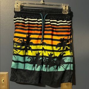 Tropical Sunset Kids Swim Trunks
